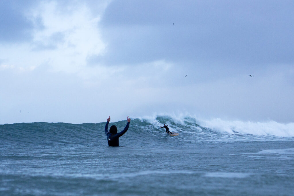 otter wooden surfboards sustainable surfer wave