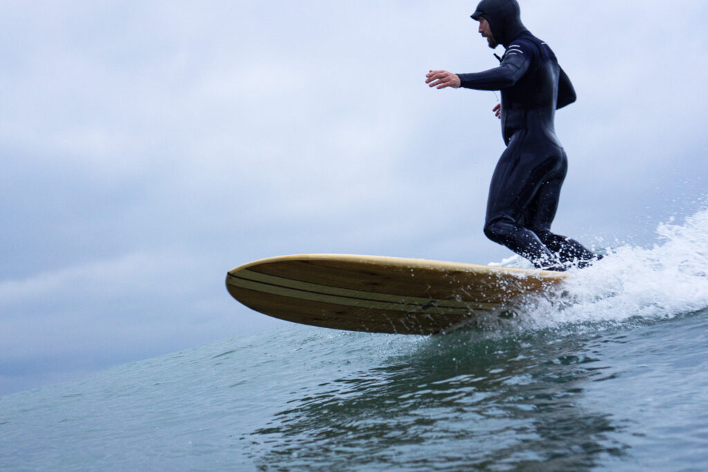 otter sustainable wooden surfboards surfing wave surfer