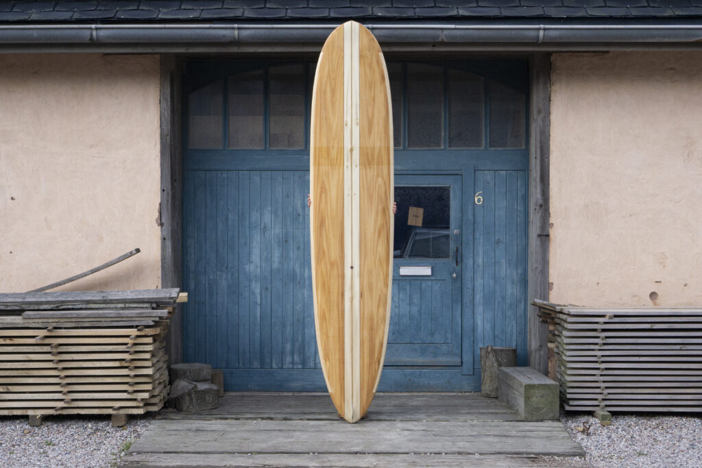 otter sustainable wooden surfboard
