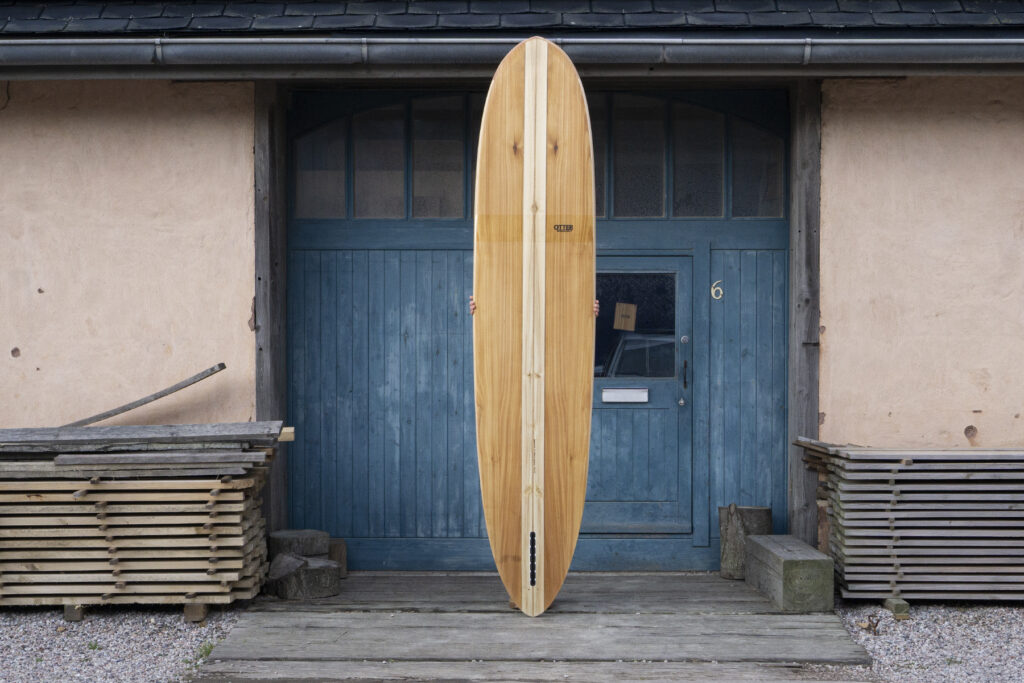otter sustainable wooden surfboard