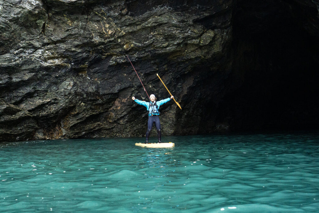 James Otter paddles one of his sustainable, wooden paddleboards.