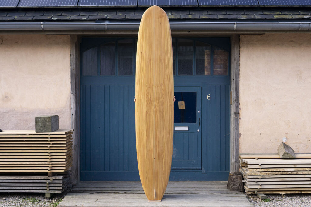 sustainable, hollow wooden surfboard longboard by Otter Surfboards