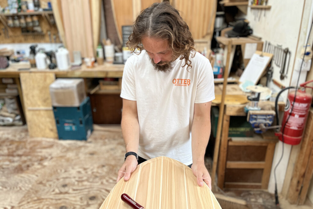 Shaping Otter Surfboards 9'1 Wicket hollow wooden surfboard