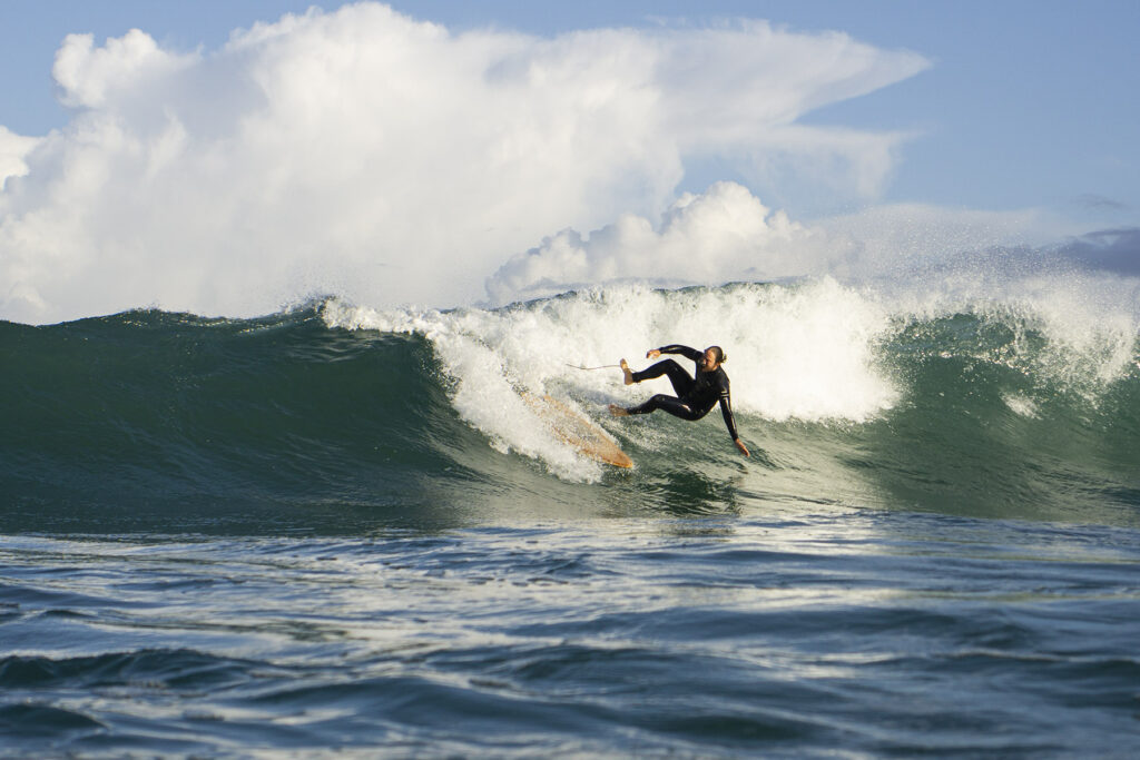Surfing sustainable hollow wooden surfboards in Cornwall, UK