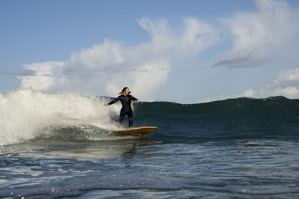 Surfing sustainable hollow wooden surfboards in Cornwall, UK