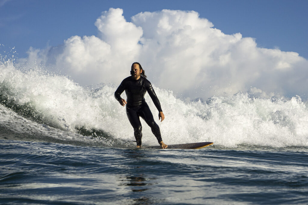 Surfing sustainable hollow wooden surfboards in Cornwall, UK