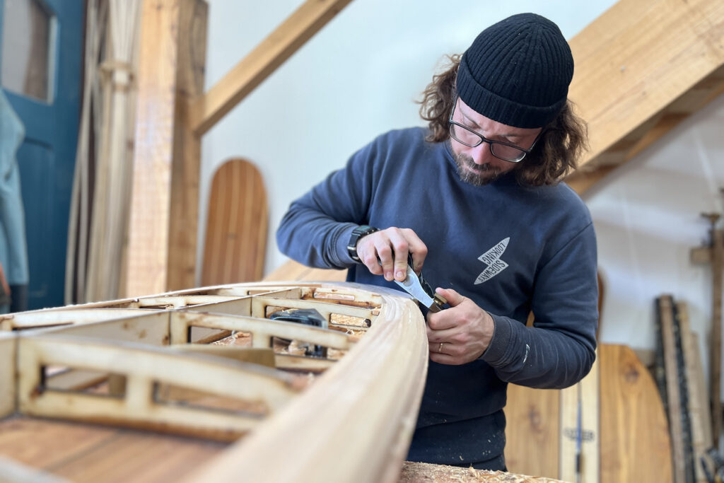 Sustainable, hollow wooden surfboard shaping