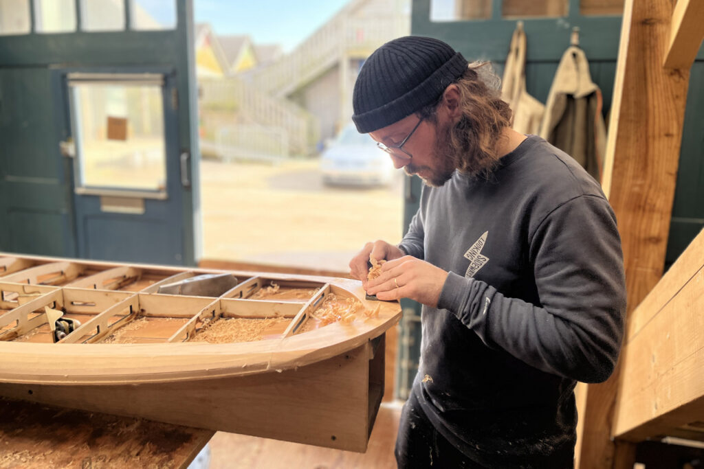 Sustainable, hollow wooden surfboard shaping
