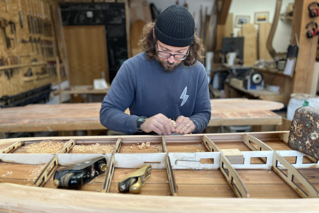 Sustainable, hollow wooden surfboard shaping