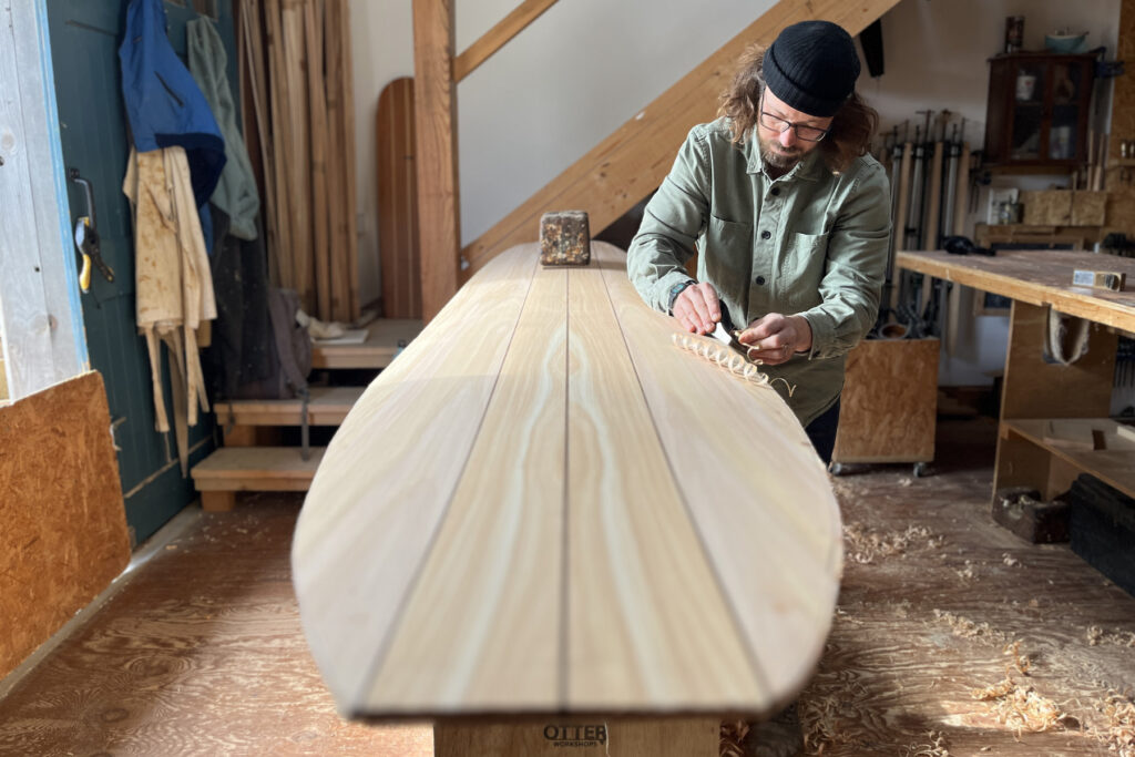 Sustainable, hollow wooden surfboard shaping