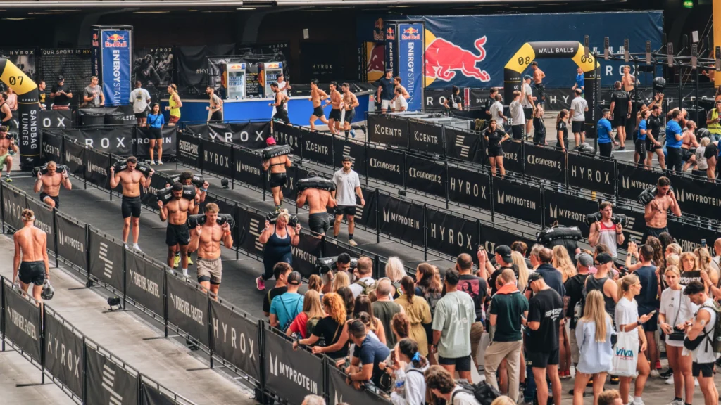 HYROX arena crowd cheering athletes in the arena