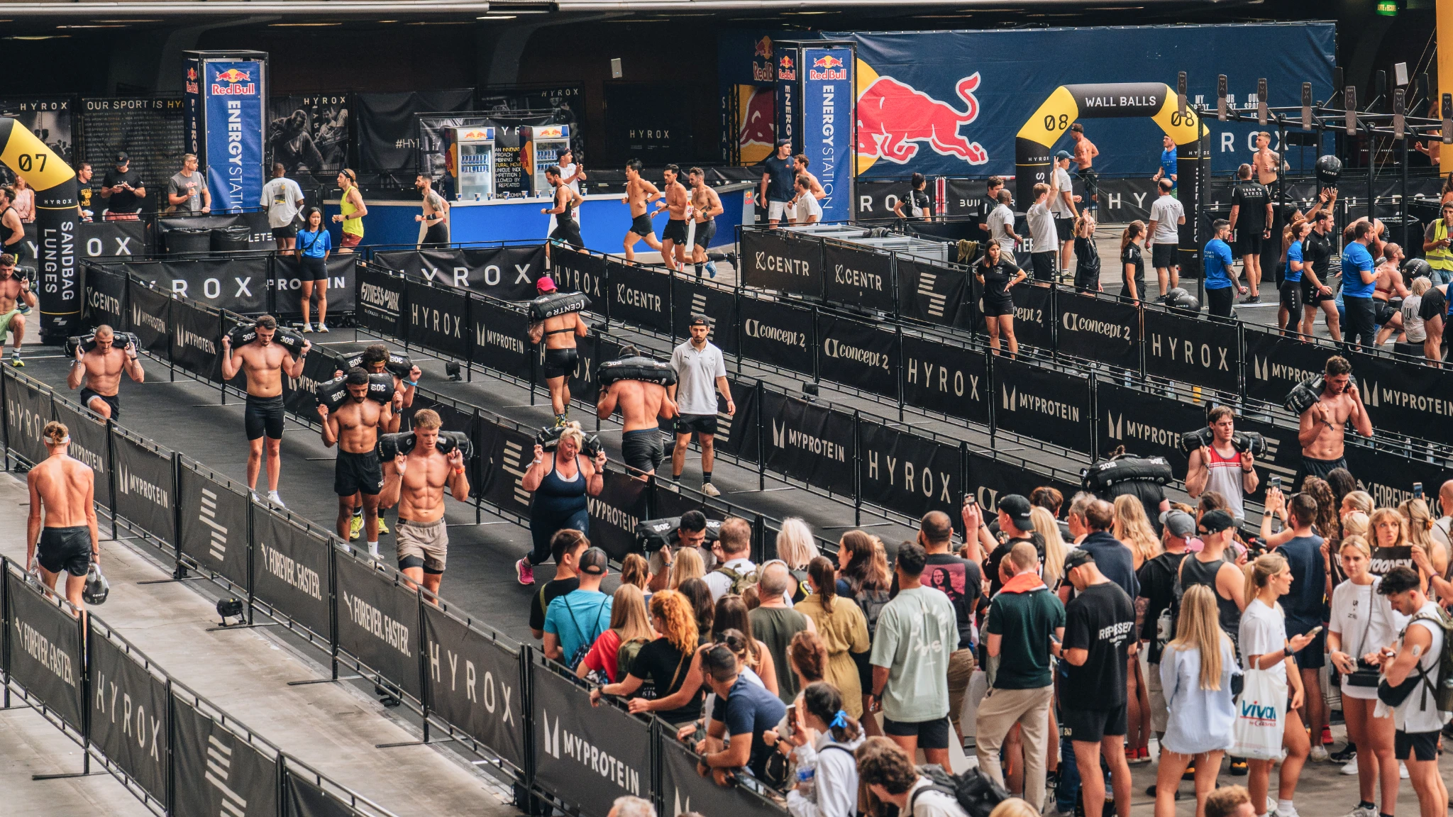 HYROX arena crowd cheering athletes in the arena