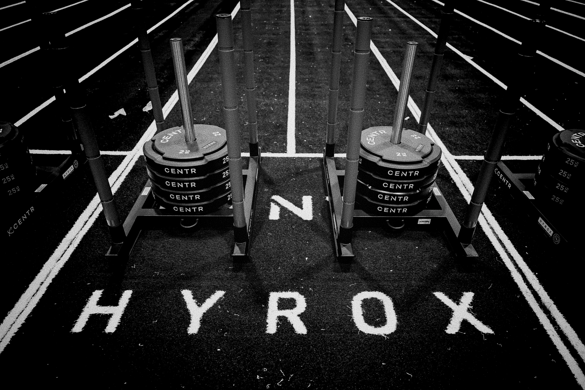 a HYROX partner gym with sled pushes