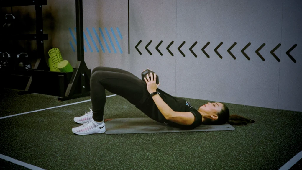 100 Weighted Glute Bridges