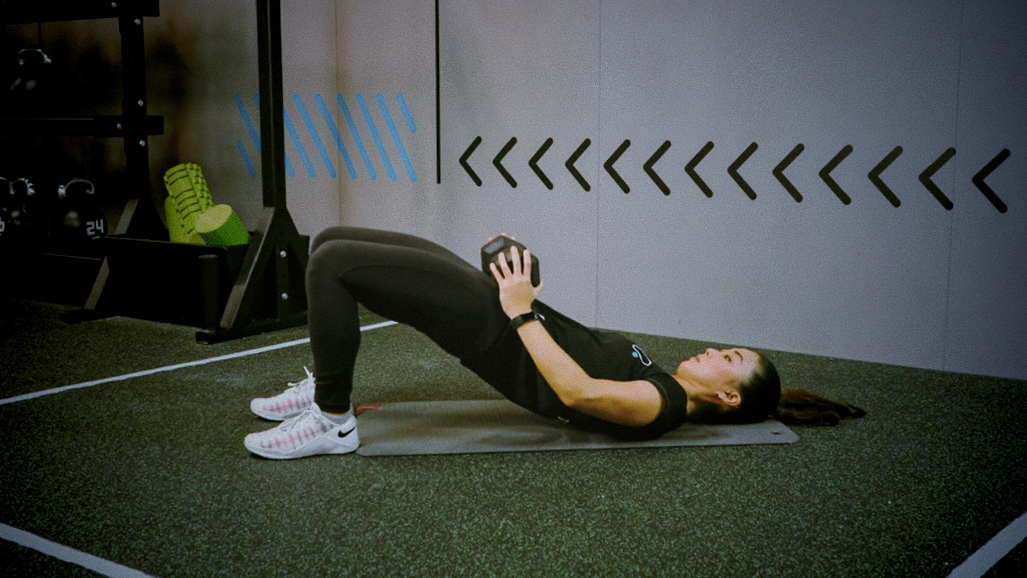 100 Weighted Glute Bridges