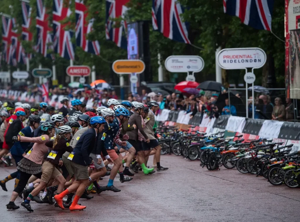 Brompton World Championship Le Mans-style start with riders running towards their folded bikes