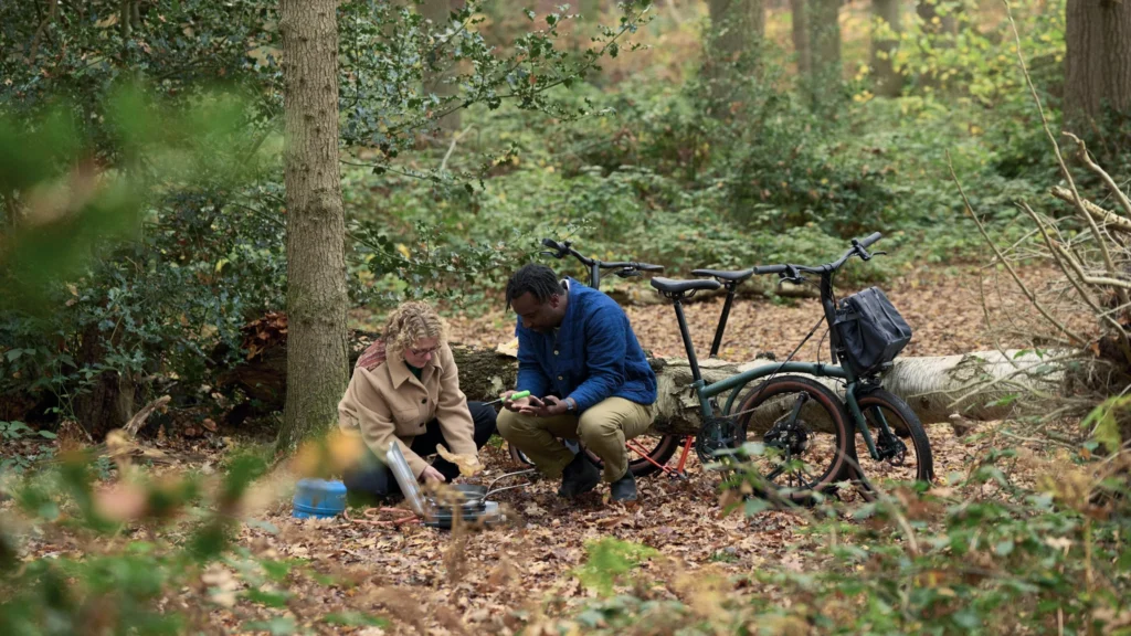 Sally & Jimmy cooking in the woods
