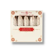 Rocky Patel Grand Reserve Half Corona five-cigar pack in cream, red and gold presentation box, containing compact 3½ x 46 cigars.