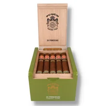Open Punch Princesas Edición Limitada 2025 box showing five Cuban cigars in the upper tray, anniversary and limited edition bands, natural wood interior and olive-green lacquered case.