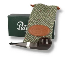 Peterson Pipe of the Year 2026 Heritage 493 Squat Bulldog with smooth dark briar finish, sterling silver mount, black P-Lip stem, Donegal tweed pouch and presentation box.
