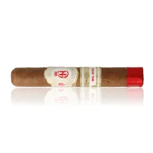 Crowned Heads Mil Días Edmundo single loose cigar photographed diagonally against a white background, showing its light brown Ecuadorian Habano wrapper, ornate cream and gold Crowned Heads band with red emblem, separate Mil Días band and bright red ribbon