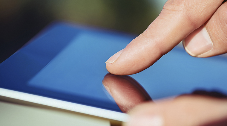 Man using digital tablet