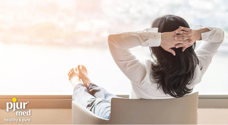 pjurmed woman sitting on a chair