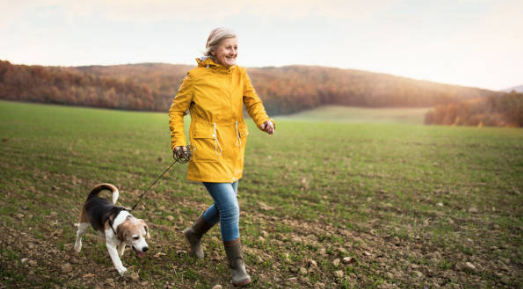 woman walking a dog
