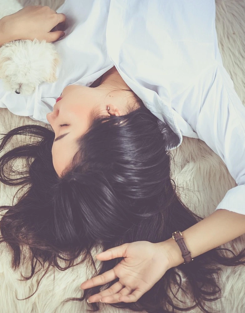 Person peacefully sleeping —illustrating the restorative power of sleep and emotional comfort.