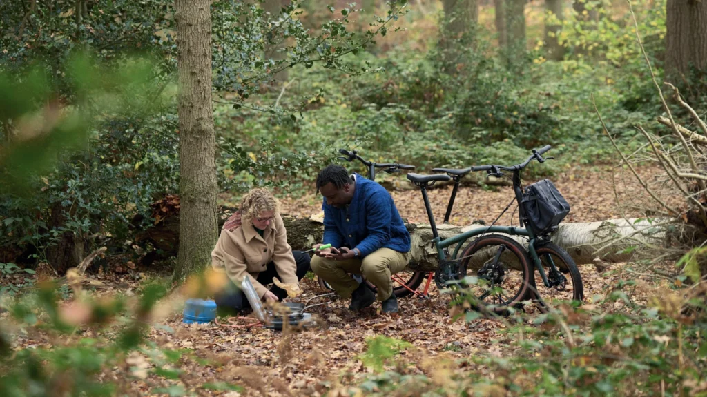 Sally & Jimmy cooking in the woods