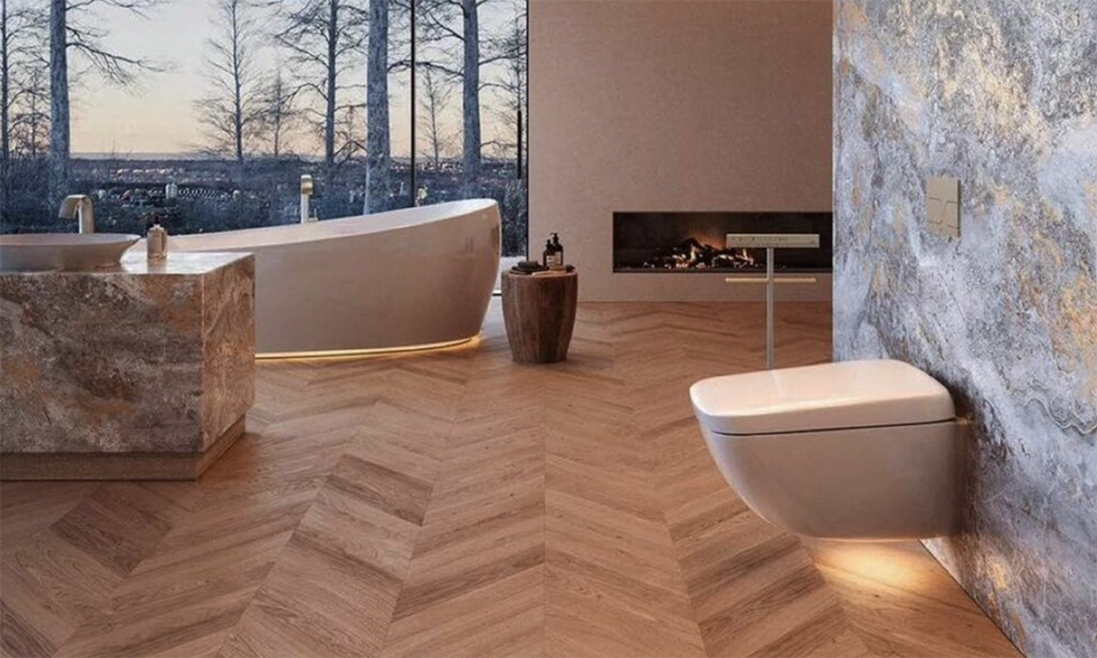 Luxury bathroom with herringbone wood floors and freestanding bathtub