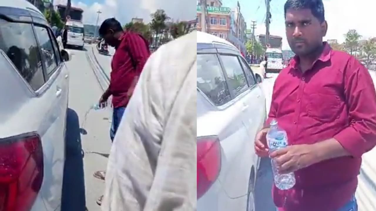 'This isn’t India'—Indian tourists in Nepal made to clean gutkha spit on the street