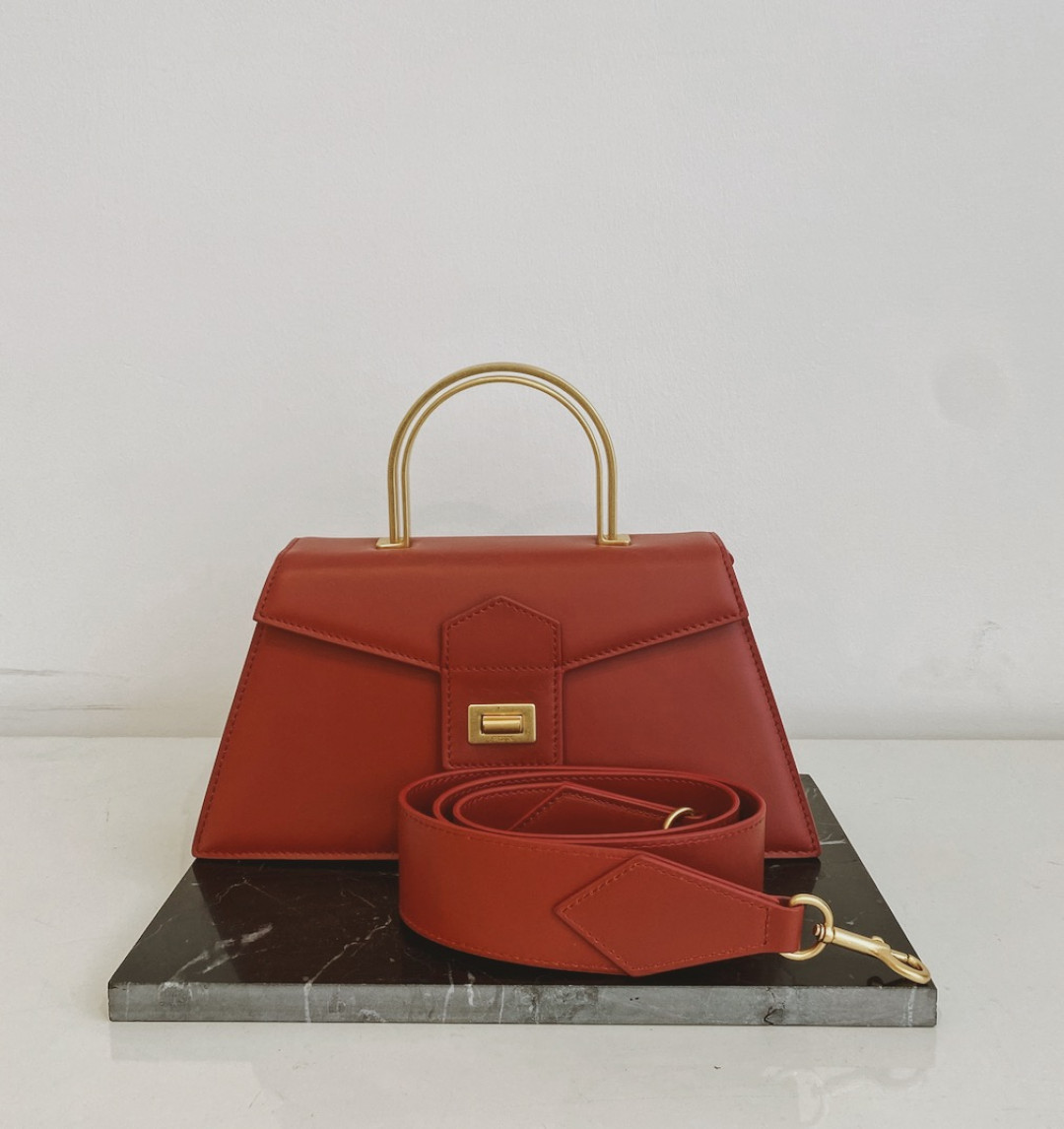 Le Book in Dark Red with Gold Metal Handle by  on curated-crowd.com