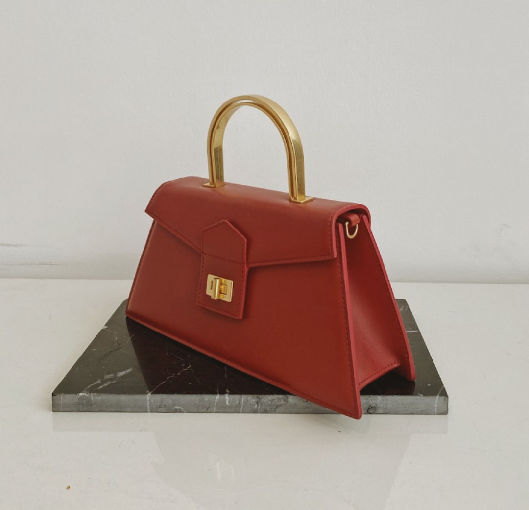 Le Book in Dark Red with Gold Metal Handle by  on curated-crowd.com