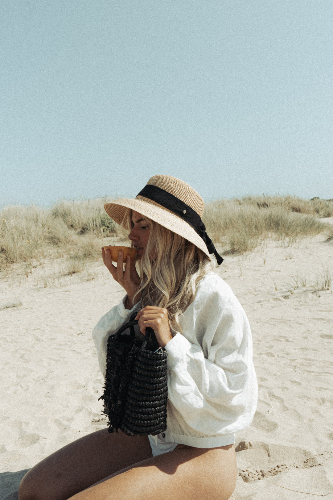Midnight Twist Straw Bag by  on curated-crowd.com