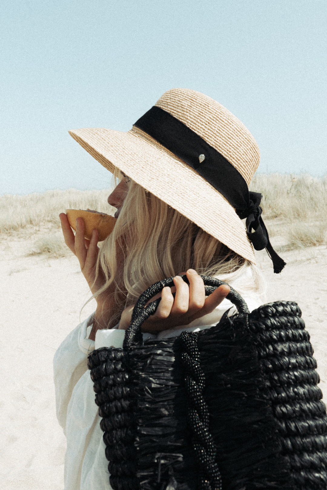 Midnight Twist Straw Bag by  on curated-crowd.com