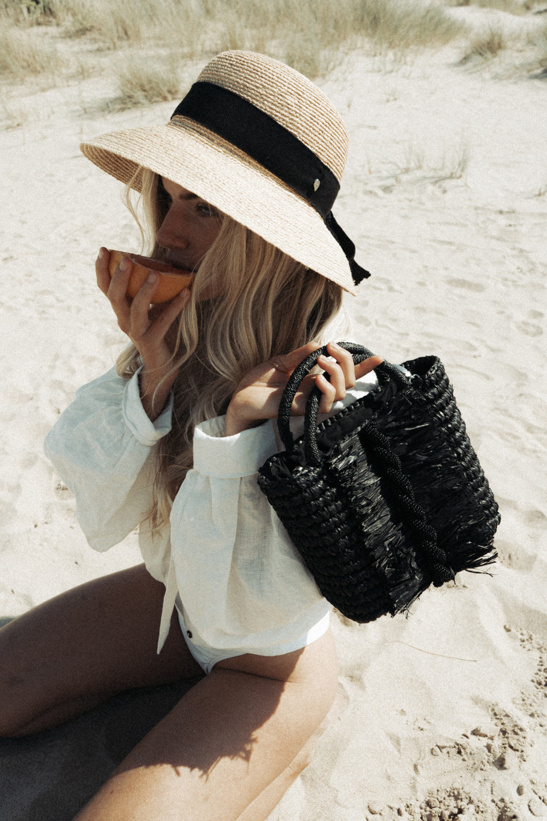 Midnight Twist Straw Bag by  on curated-crowd.com