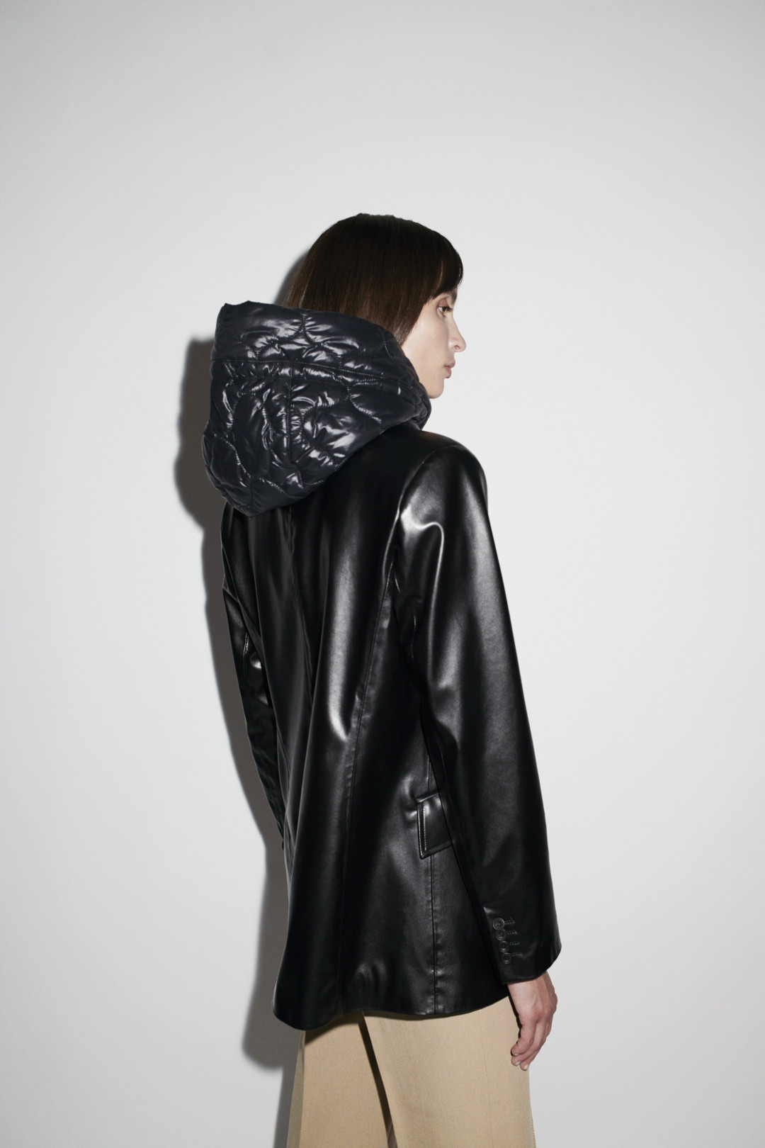 Aurora Quilted Hood in Soft Black by  on curated-crowd.com