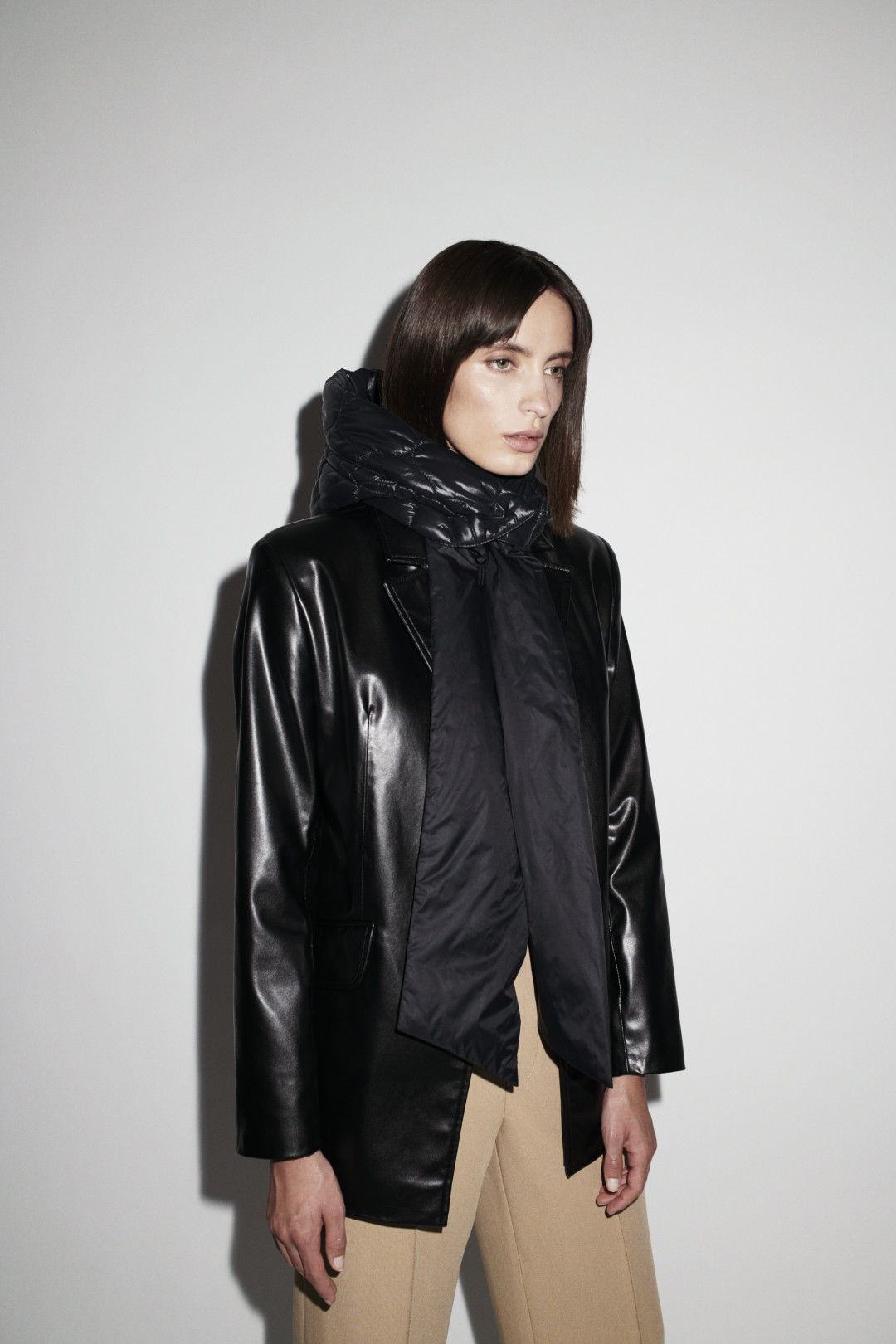 Aurora Quilted Hood in Soft Black by  on curated-crowd.com
