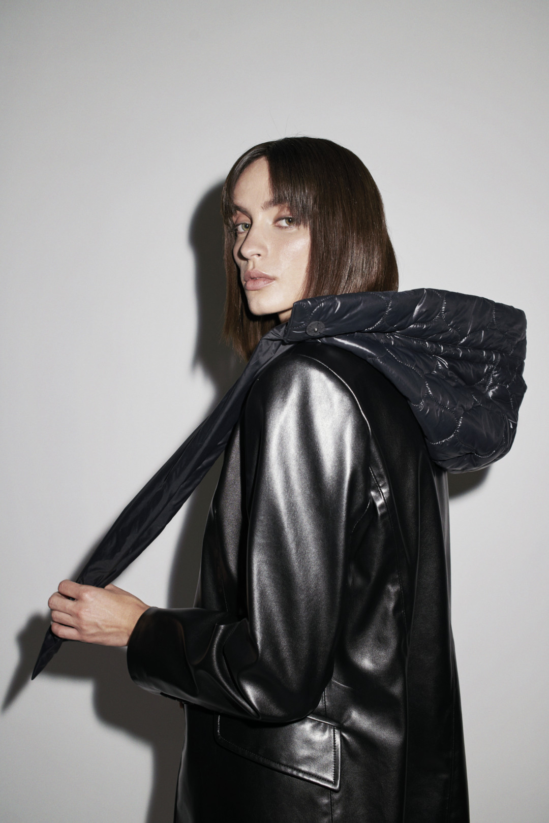 Aurora Quilted Hood in Soft Black by  on curated-crowd.com