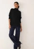 Chevron Detail Polo Neck Sweater in Jet Black by LOOP Cashmere on curated-crowd.com