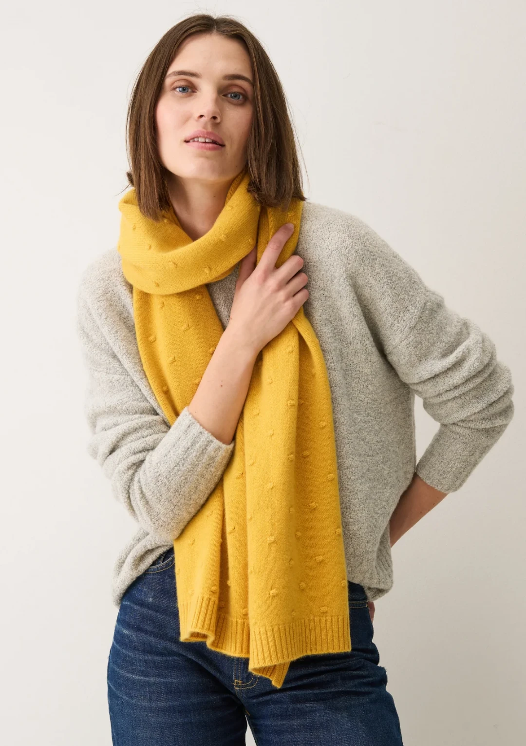 Bobble Scarf in Melon Yellow by LOOP Cashmere on curated-crowd.com