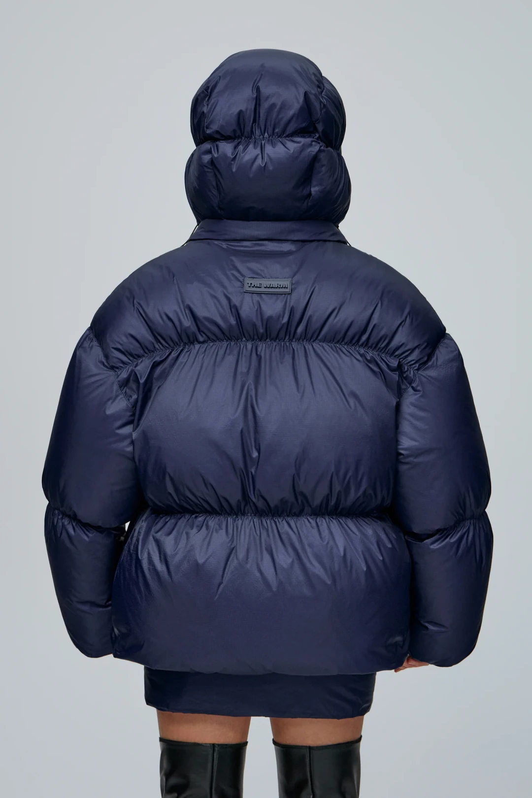 Marshmallow Navy Puffer Jacket by THE WARM on curated-crowd.com