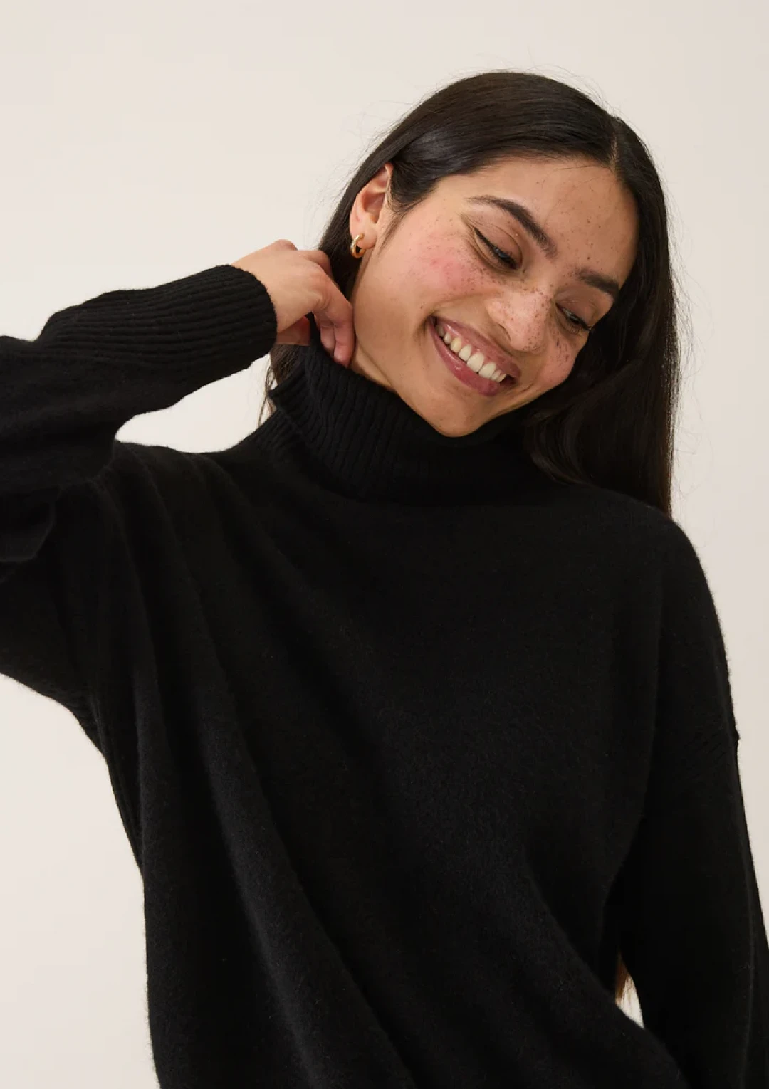 Chevron Detail Polo Neck Sweater in Jet Black by LOOP Cashmere on curated-crowd.com