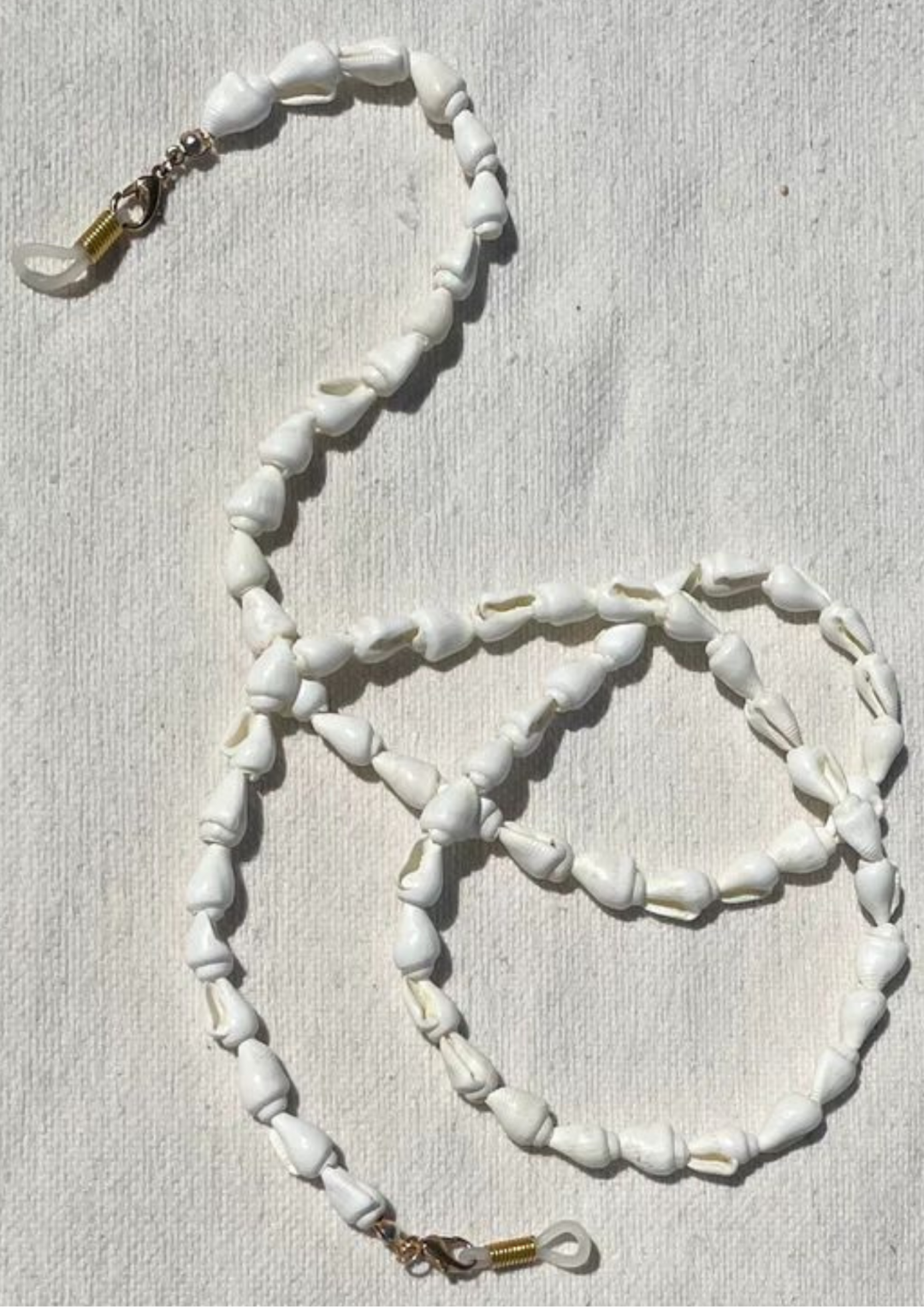 Collecting Shells Sunglass Chain by Saint Holiday on curated-crowd.com