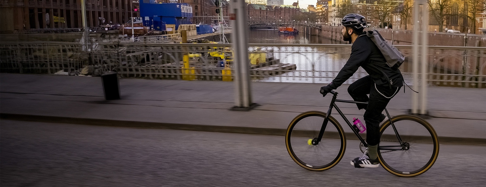 A man and woman taking a break from cycling