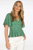 Green Polka Dots Tie Back Peplum Blouse