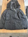 Black Quilted Jacket with Faux Fur Hood and Sleeve Zip Pocket