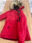 Red Quilted Jacket with Faux Fur Hood and Sleeve Zip Pocket