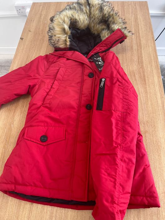 Red Quilted Jacket with Faux Fur Hood and Sleeve Zip Pocket